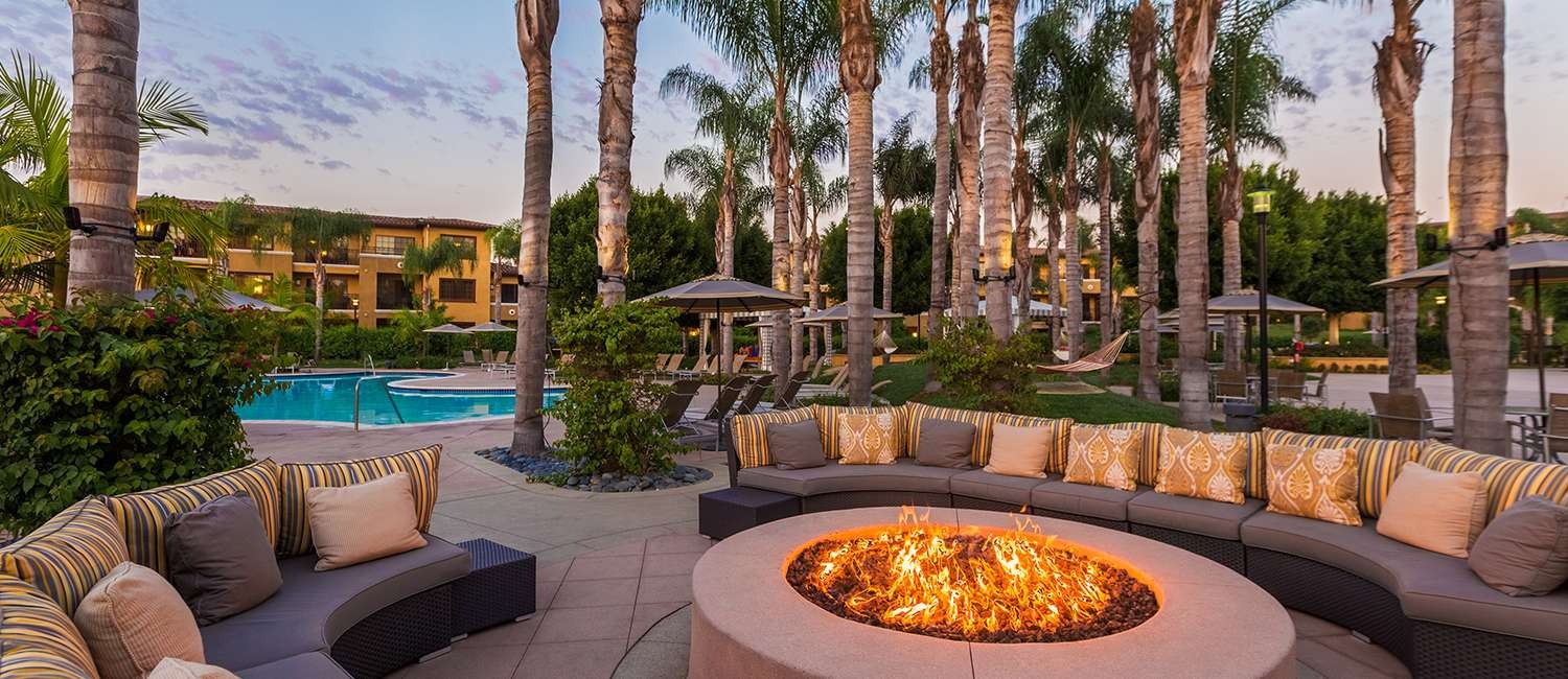 GALLERY OF ELEGANT CONDOMINIUMS AND SUITESAMID BEAUTIFUL LANDSCAPE IN CARLSBAD, CA